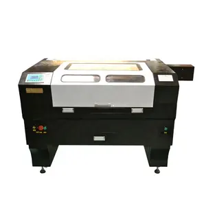 Guangzhou Hanniu K9060 CO2 máquina de grabado de corte por láser para tela cuero madera plástico