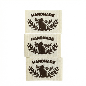 Étiquettes cousues lavables en non-tissé écologiques avec logo de marque personnalisé pour sacs/chaussures/vêtements - Luxe durable - Product Image 1