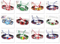 233 pays/régions peuvent personnaliser les drapeaux nationaux, les promotions de la fête nationale, les cadeaux de bracelet en cuir à breloques rondes