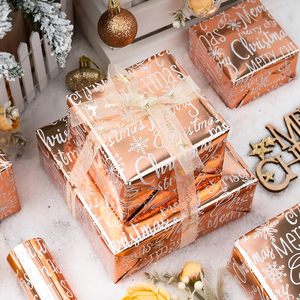 MAYPLUSS Foil Christmas <b>Wrapping</b> <b>Paper</b> 17 Inch X 33 Feet Rose Gold Script Snowflake Anti Curl Roll - Product Image 5