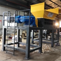 Broyeur à double arbre robuste de type 1000 pour le recyclage de cadres de motos et de tricycles, et le broyage de gros morceaux de caoutchouc