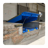 Pont d'accès hydraulique électrique fixe, niveleur de quai, plateforme de chargement et de déchargement