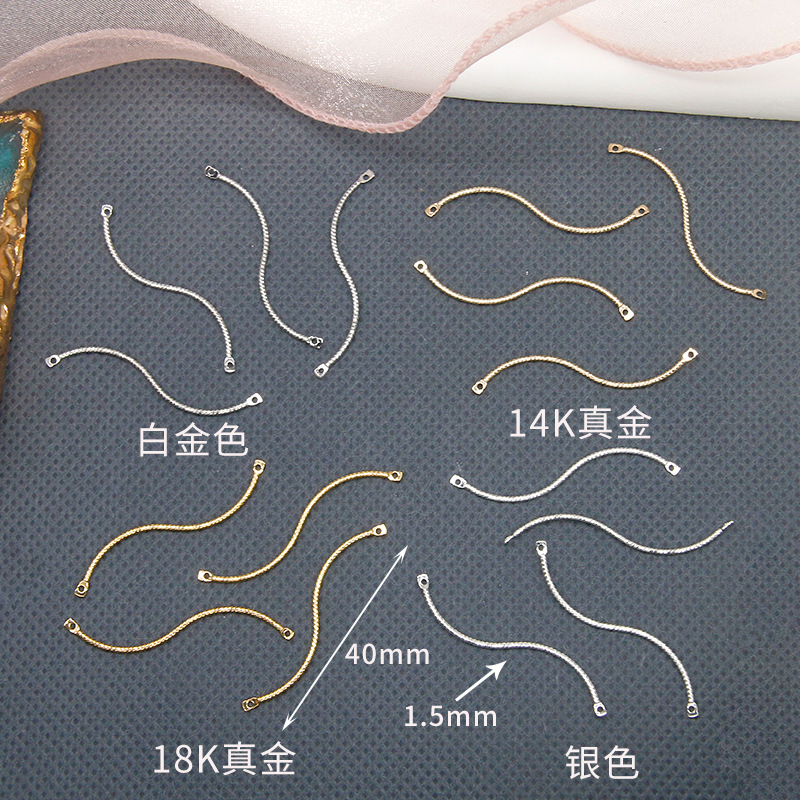 Boucle d'oreille pendante double en forme de S avec fleur