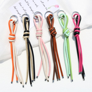 En gros, Porte-clés en corde de cuir PU tressée bicolore, Pendentif de sac polyvalent et tendance, Porte-clés de voiture, Cordon de téléphone anti-perte - Product Image 1
