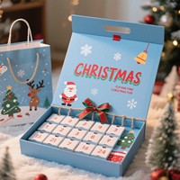 Boîte de calendrier de l'Avent de Noël personnalisée avec logo, bleu clair, poignée découpée à la main, 24 compartiments, ruban rouge et vert, nœud, imprimé Père Noël et renne, cadeau rigide