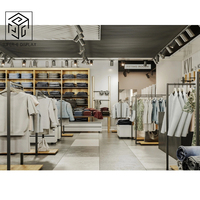 Marque de luxe personnalisée Décoration de magasin de vêtements Boutique tendance Boutique de vêtements Présentoir de design d'intérieur Moderne et écologique