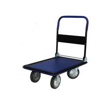 Chariot à plateforme à 4 roues bleu et noir pour entrepôt