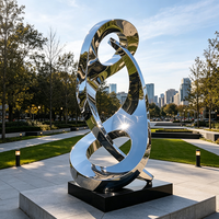 Sculpture d'art métallique abstraite moderne sur mesure de grande taille, statue en acier inoxydable poli miroir 316L pour la décoration extérieure des hôtels et des jardins