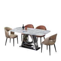 Ensemble de salle à manger moderne avec chaises en tissus variés, table à manger durable avec plateau en marbre pour meubles d'appartement