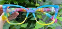 Gafas Ópticas de Acetato de Celulosa con Efecto Ojo de Gato Arcoíris Vibrante, Montura Transparente Multicolor con Degradado en Espiral