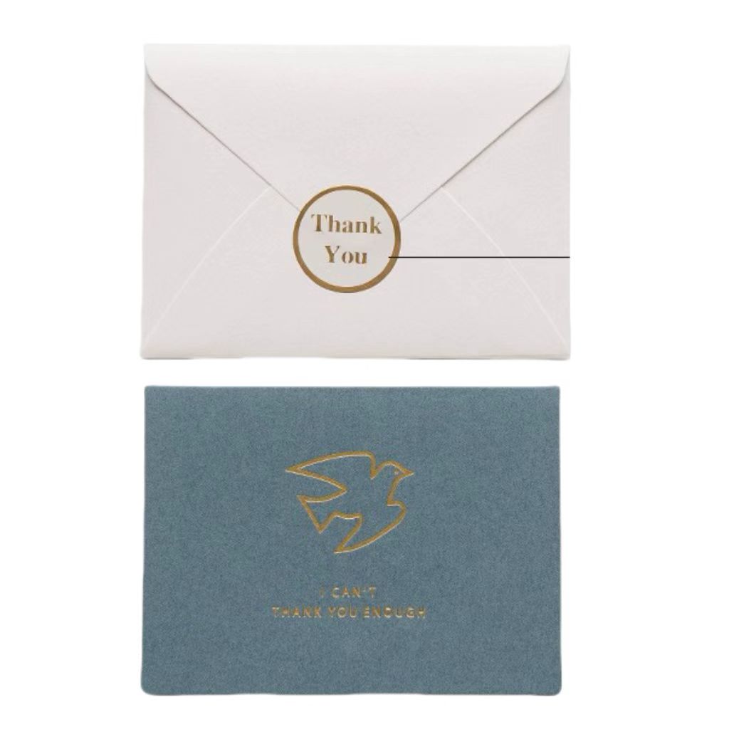 C 1 carte de vœux + 1 enveloppe + 1 autocollant /ensemble