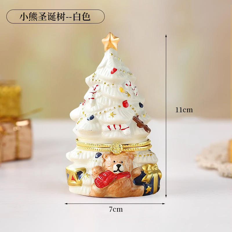 White Christmas tree with a bear