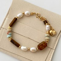 Bracelets de haute qualité imperméables multicolores en perles naturelles et en perles de plastique pour femmes Bijoux tendance de la fabrique