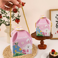 Boîte pliable rose de qualité supérieure pour Pâques, avec des lapins de dessin animé peints à la main et un ruban doré élégant, boîte de rangement pour bonbons, biscuits, gâteaux, boîte cadeau
