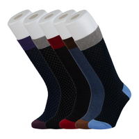 Chaussettes habillées respirantes à petits points pour femmes Chaussettes d'affaires au genou pour printemps automne Utilisation quotidienne avec logo sur la manchette du corps