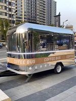 Camion de restauration rapide mobile en acier inoxydable entièrement équipé pour la vente de glaces, de café, de barbecue et de bonbons, avec un design personnalisé de colibri