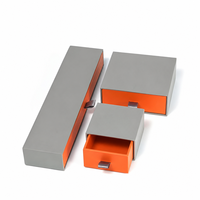 Boîte cadeau coulissante style tiroir pour cosmétiques avec ruban, gris mat et orange, fournisseur OEM personnalisé en gros