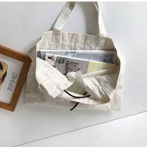 กระเป๋าผ้าแคนวาสแบบมีเชือกผูก  รีไซเคิลได้  สกรีนโลโก้ได้ตามต้องการ  ขายส่ง MOQ ต่ำ |   ถุงช้อปปิ้งและถุงโปรโมชั่น - Product Image 6