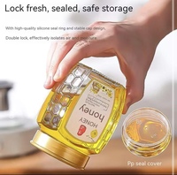 Fabrik-Großhandel Neues Sechseckiges Honigglas mit Bienenstock-Muster, 380ml/500ml/730ml, mit Deckel