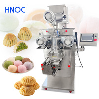 Machine automatique HNOC pour la fabrication d'arancini, de croquetas, de moon cake, de coxinha, de maamoul, de kubba, de mochi et de kibbeh