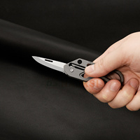 Porte-clés portable couteau pliant multifonctionnel Mini alliage de titane et acier inoxydable avec matériau métallique tranchant
