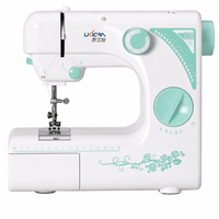 Machine à coudre domestique pour le bricolage à domicile avec moteur à économie d'énergie, commandes pratiques, idéale pour les débutants et les enfants.