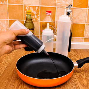 Botella cilíndrica de plástico para salsa, resistente a fugas, para almacenamiento de condimentos líquidos - Product Image 1