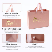 Sac de luxe personnalisé pour la vente de vêtements au détail sac d'emballage cadeau en rose bolsas de papel sacs d'emballage à provisions en papier avec poignées pour vêtements