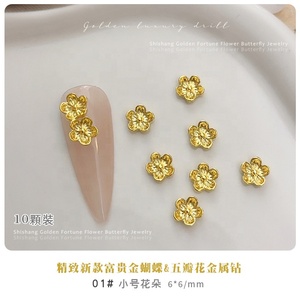 Paso Sico 10 pièces/sac Décoration d'ongles 3D en alliage doré de luxe, 4 motifs (fleurs, papillons) pour femmes - Product Image 6