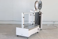 Machine à cerclage automatique électrique pour cartons lourds, table basse 450 mm, avec courroie PP pour boîtes en carton