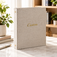 Classeur moderne en lin personnalisé à feuilles mobiles pour une gestion optimale du papier, idéal pour les cadeaux d'entreprise et les présentations.
