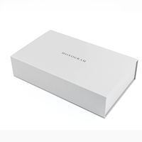 Boîte rigide de luxe de style livre, design gratuit, papier mat laminé, gaufrage personnalisé, insert en mousse EVA, fermeture magnétique