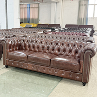 Fauteuil Chesterfield classique en cuir véritable avec dossier rembourré en éponge, fauteuil d'appoint à boutons pour salon et hôtel