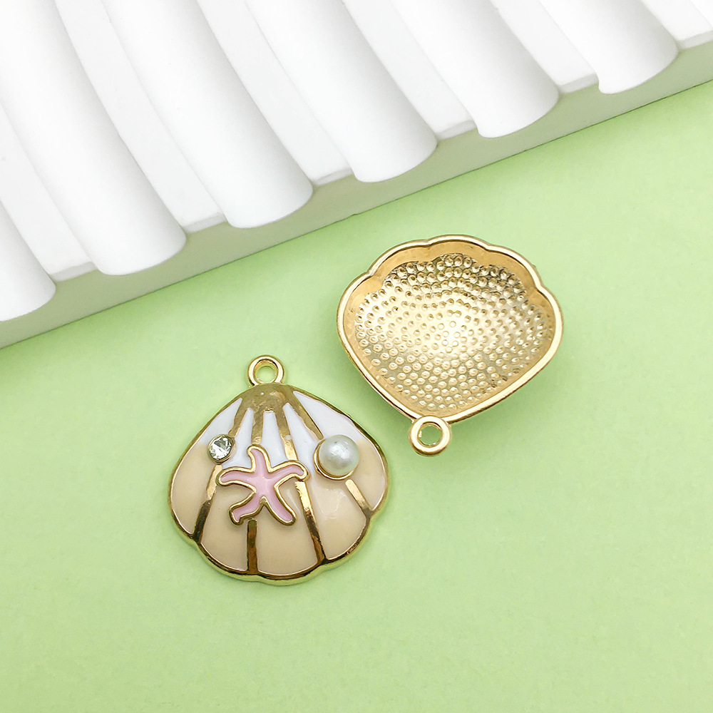 1 oil-dripping flesh-colored starfish pearl shell 20*21mm - 2g - 12037