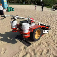 Machine de nettoyage de plage manuelle légère pour ramasser le sable, les coquillages, les pierres et les débris, idéale pour le nettoyage des plages en bord de mer