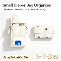 Sac à couches matelassé brodé personnalisé OEM ODM pour bébé, organisateur de couches léger et compact pour maman, idéal pour l'extérieur