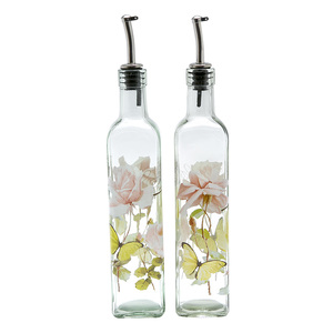 Colorful empty oil bottle with pump oil dispenser glass bottle