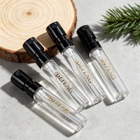 Flacon d'échantillon de parfum rond en verre miniature personnalisé de 2 ml, transparent, avec boîte, flacon pulvérisateur en verre de voyage de 1,5 ml