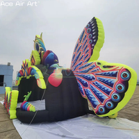 Cabine de DJ gonflable en forme de papillon avec des ailes colorées - Scène d'événement portable pour discothèques, fêtes et locations de spectacles