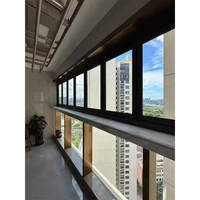Grille de fenêtre pliante moderne en alliage d'aluminium antivol, double vitrage trempé, design personnalisable pour balcon à ouverture verticale