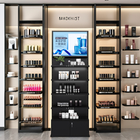 Présentoir de magasin de cosmétiques de marque de mode moderne Étagères de magasin de maquillage à couches noires Étagères de parfum avec éclairage