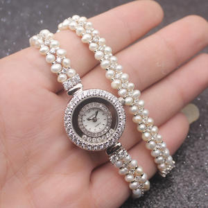 ساعة نسائية بعجلة الحظ وحلية من اللؤلؤ الطبيعي، حركة كوارتز، إطار من السبائك، زجاج ياقوتي، سوار 16 ملم، حزام طويل مقاوم للماء - Product Image 6