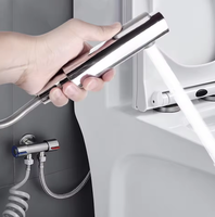 Pulvérisateur de bidet portable en plastique ABS avec une seule sortie d'eau, design moderne, installation facile pour salle de bain, toilettes, douche
