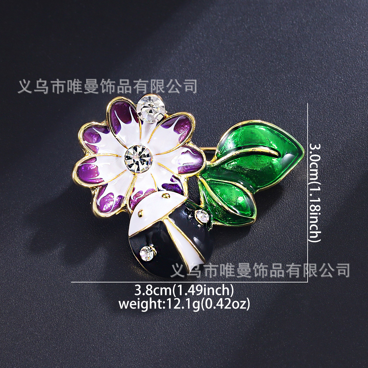 KC Insecte noir doré, fleur pourpre, feuille verte