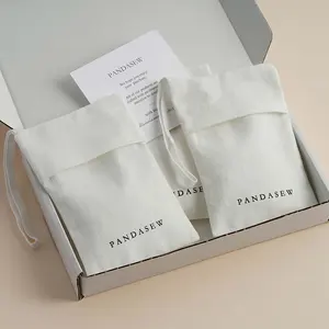 PandaSew özel Logo 13x8cm yüksek kaliteli beyaz balıksırtı pamuk ambalaj çanta hediye takı kılıfı
