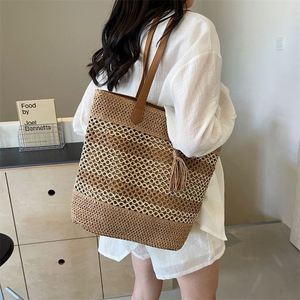 New Fashion Casual Woven Summer Beach Handbag Women Hollow Out Seaside Vacation Straw <b>Tote</b> Bag With Tassels - Product Image 4