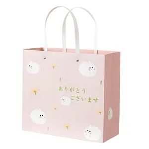 Factory wholesale flat rope handle boutique shopping rivets packaging customized printing logo tote paper gift bags