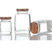 Pot en verre rond à large ouverture avec couvercle à vis électro-plaqué pour complément alimentaire en capsules de miel haut de gamme 50 100 75 180 280 360 ml en plastique