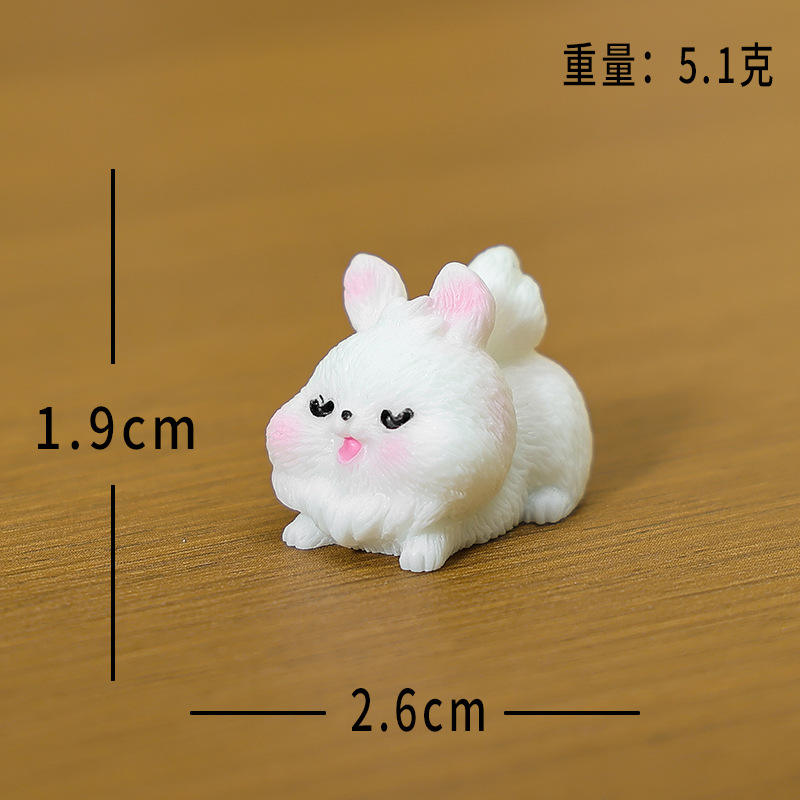 Conejo de cola grande acostado