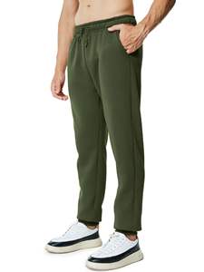 กางเกงวอร์มผู้ชายผ้าฝ้ายกันน้ำ มีกระเป๋า ทรงหลวมปานกลาง เหมาะสำหรับออกกำลังกาย วิ่ง ฟิตเนส ลำลอง สตรีทแวร์ ลายผ้าใบ - Product Image 2